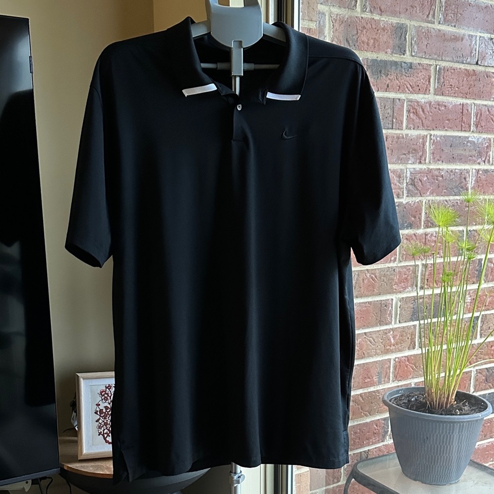 Nike Men's Black Polo Shirt with White Accents - Picture 2 of 7
